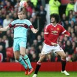 Andy Carroll of West Ham United and Marouane Fellaini of Manchester United ManU during the Emirates